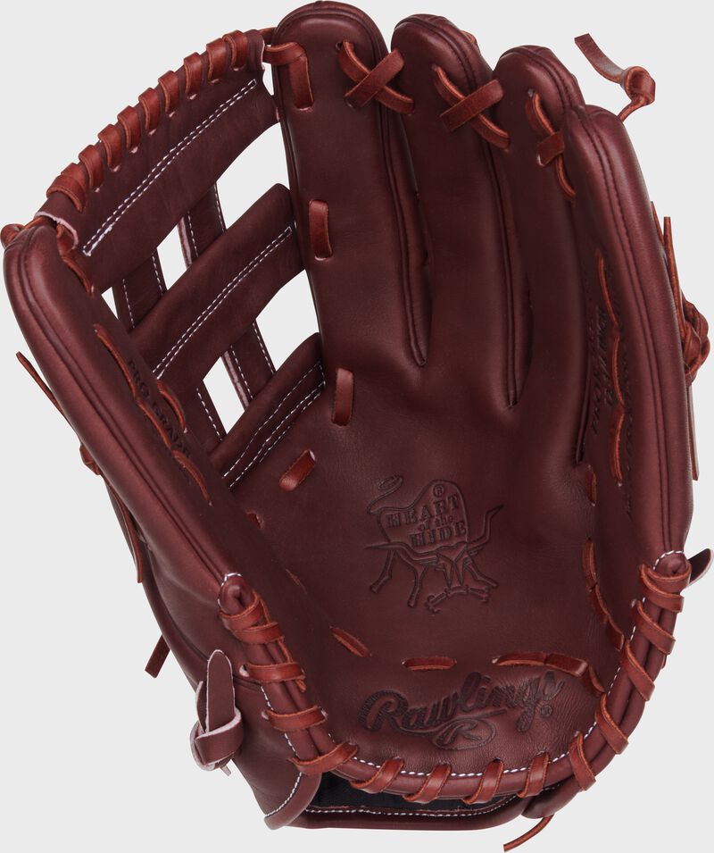 Sherry palm of a Rawlings Heart of the Hide outfield glove with sherry laces