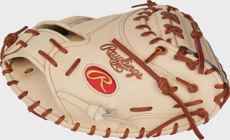 Thumb of a camel Heart of the Hide 34-Inch Catcher's Mitt with a red Oval-R on the thumb