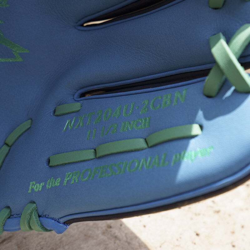 Picture of the pinky stamp on an exclusive Rawlings NXT Series 11.5" infield glove loading=