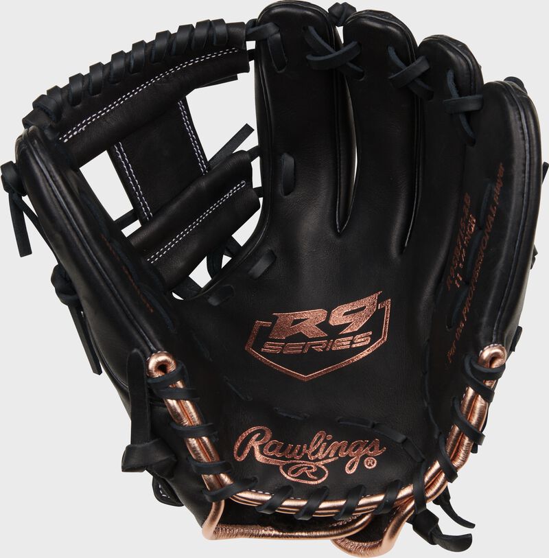 Black palm of a Rawlings R9 Series fastpitch glove with rose gold stamping and black laces