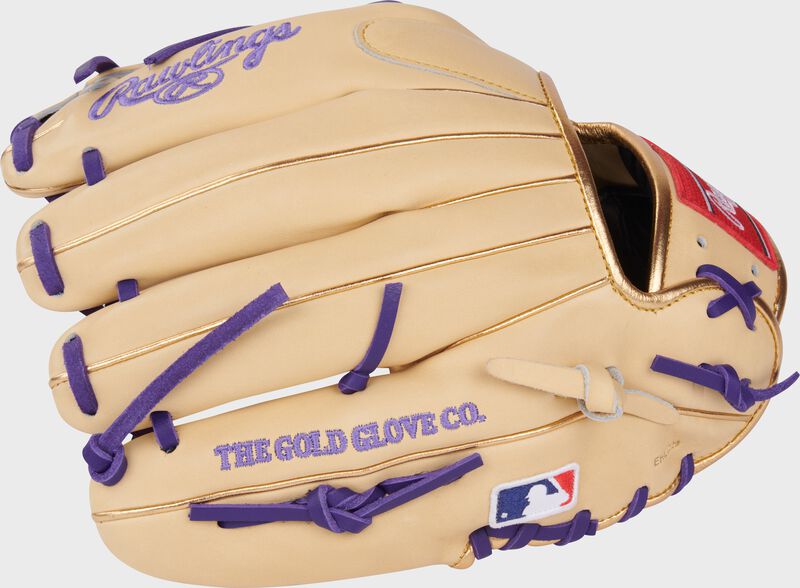 Back of a camel J.P. Crawford Heart of the Hide Infield Glove with the MLB logo on the pinky