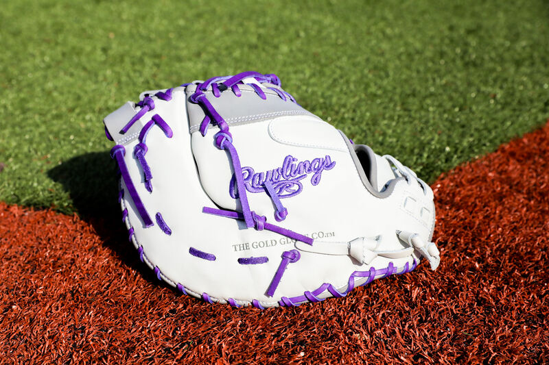 A Rawlings Liberty Advanced Color Series 1st base mitt on a field - SKU: RLADCTSBWPG loading=