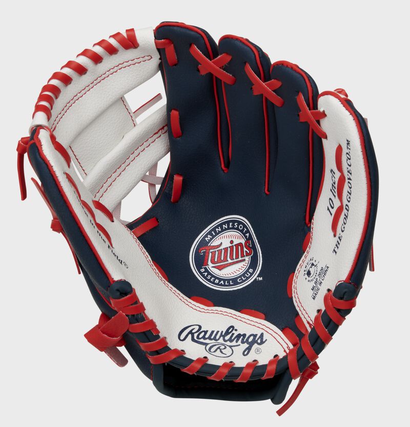 A navy, white & red Rawlings Minnesota Twins youth glove with a Twins logo stamped in the palm - SKU: 22000028111 loading=