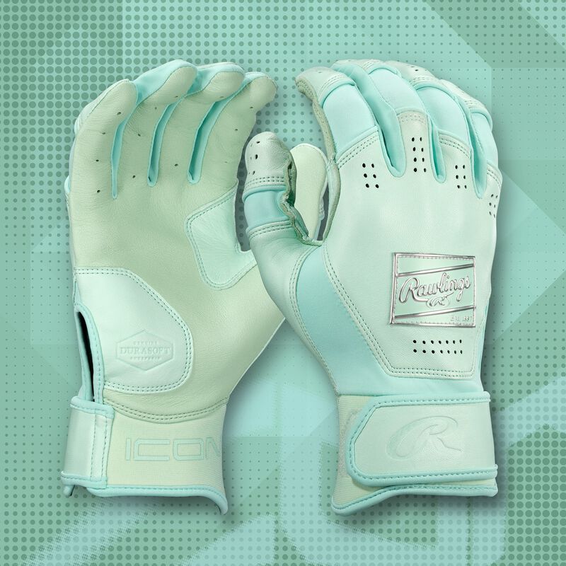 A pair of mint Icon batting gloves with a mint theme background