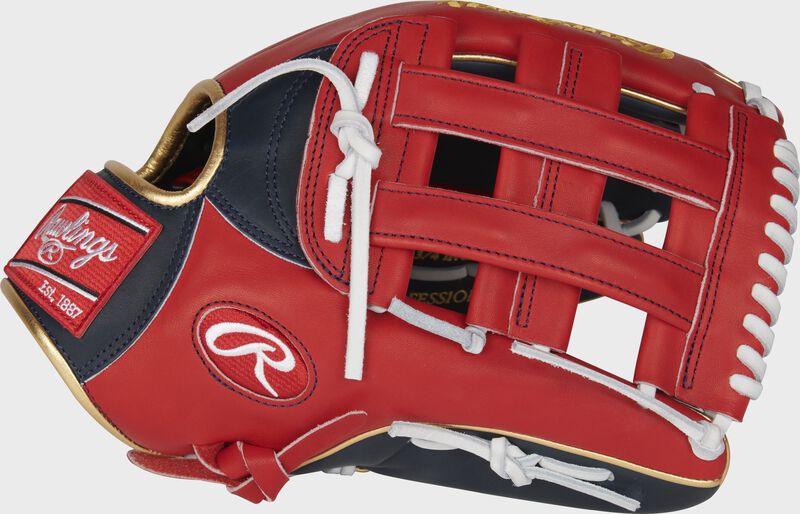 Scarlet thumb of a 2022 Ronald Acuña Jr. Pro Preferred Outfield Glove with a scarlet H-web - SKU: PROSRA13 loading=