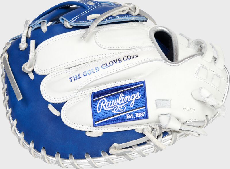 Back of a white/royal 34-Inch Liberty Advanced Color Series catcher's mitt with a royal Rawlings patch - SKU: RLACM34FPWRP loading=