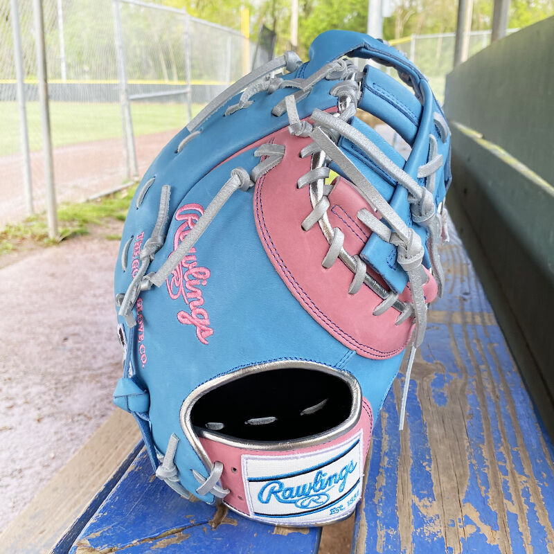 Picture of the back of a Exclusive Heart of the Hide 13-Inch 1st Base Mitt standing up on a table