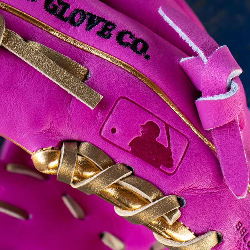 Picture of the MLB logo stamped ont he pinky of an Exclusive 11.5" R2G Heart of the Hide Berry infield glove