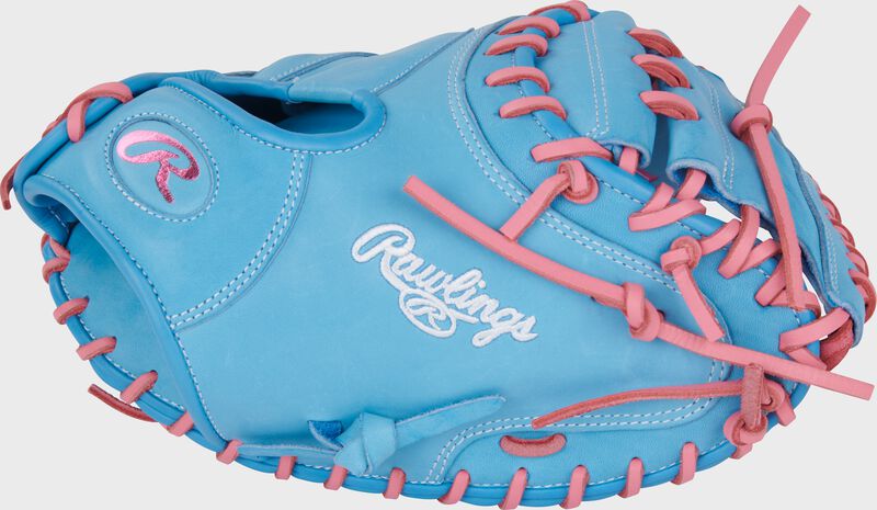 Thumb of a Columbia blue Heart of the Hide 33-Inch Catcher's Mitt with a white script Rawlings logo