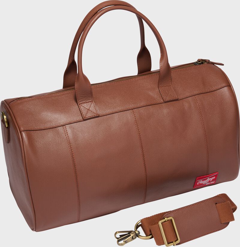 A tan Rawlings Strike Out duffle bag with the shoulder strap