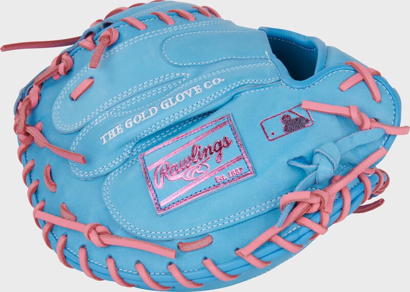 Columbia blue back of a Heart of the Hide 33-Inch Catcher's Mitt with a blue/pink leather Rawlings patch