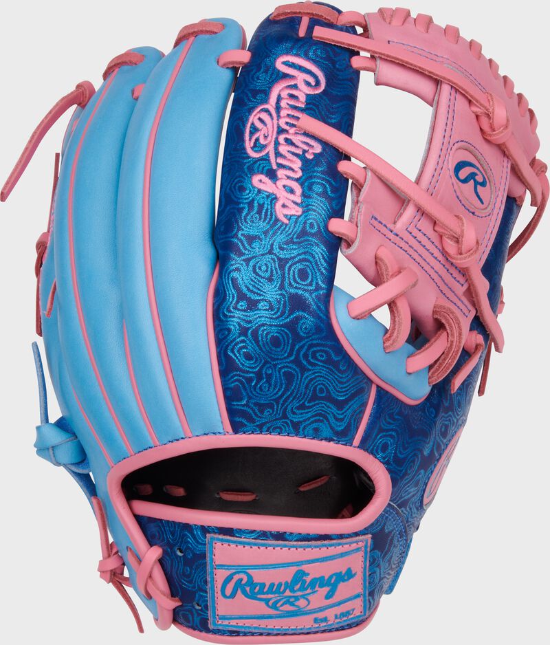 Columbia blue/royal back of a Heart of the Hide Vibrant Series blue topo print 11.5" infield glove with a pink Rawlings patch