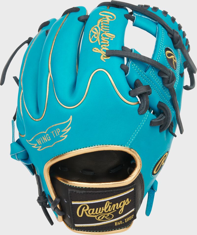 Wing Tip back of an Exclusive Heart of the Hide Teal 11.5-inch Wing Tip Glove with a black Rawlings patch