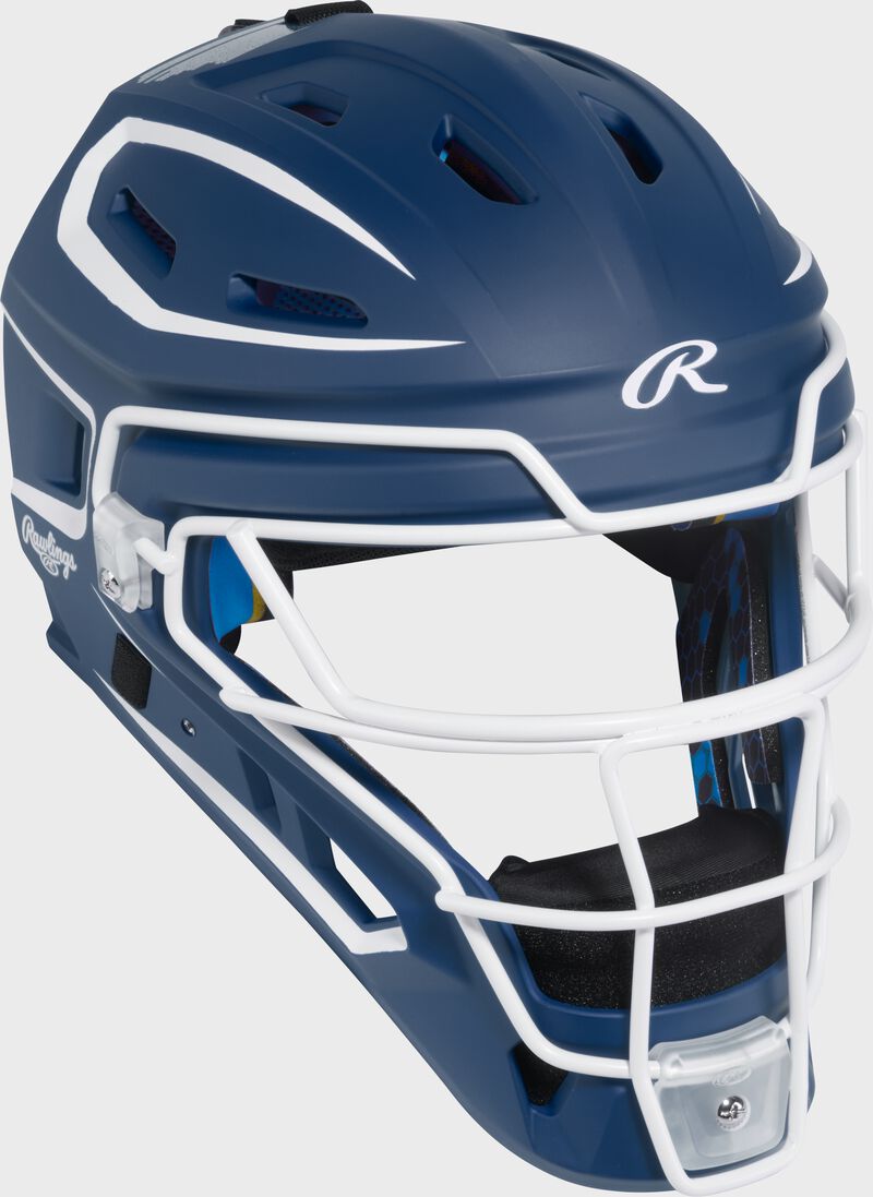 Front right of a navy Rawlings Mach Pro Series catcher's helmet