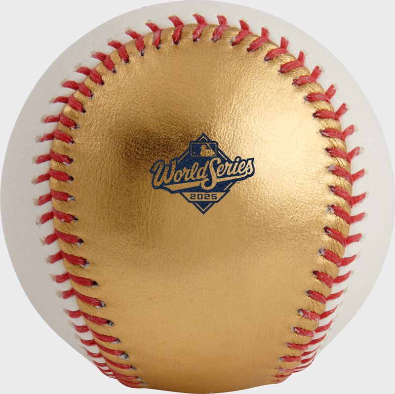 The 2025 World Series logo stamped on the gold side of a 2025 MLB Gold World Series dueling baseball